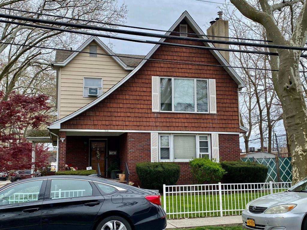 Large two-family house in prime New Dorp location. Lots of potential.