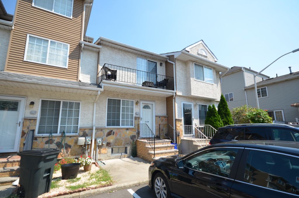 Two bedroom townhouse with private backyard and finished basement